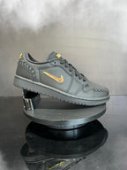 Jordan 1 Low Method of Make Black Metallic Gold