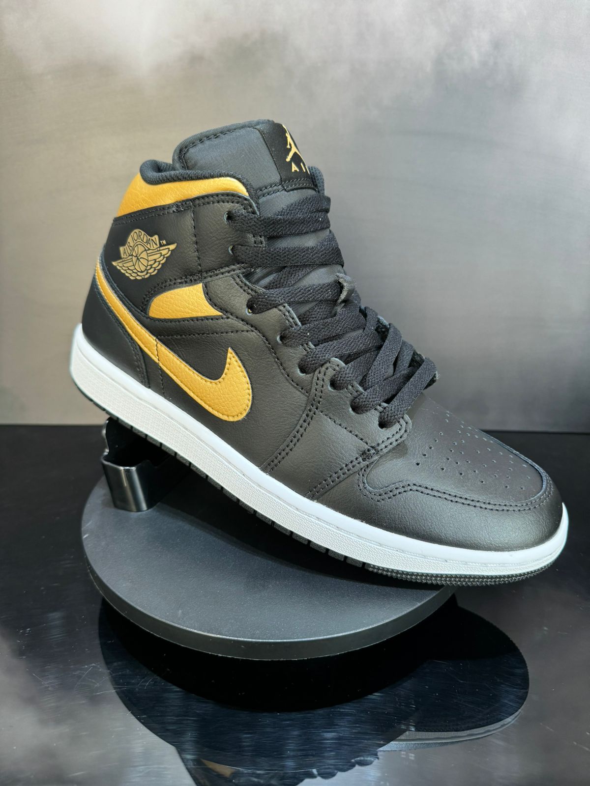 Jordan 1 Mid Black Metallic Gold